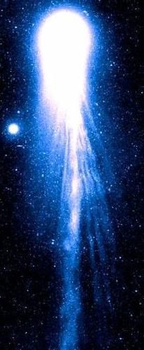 Comet Hyakutake; Bright white center with blue trails.