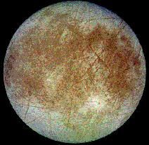 Europa; yellow, brown, orange spherical moon.