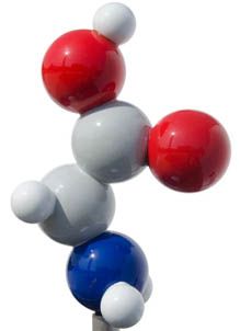 An illustration of a molecule with different colored spheres representing the elements.