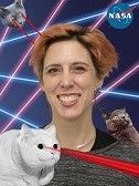 Woman with short pink hair; surrounded by photoshopped cats with laser eyes.