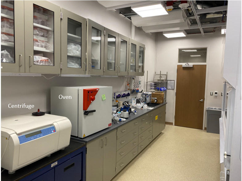 The Dirty Prep Lab featuring a centrifuge and oven
