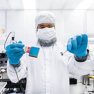 Photo of Greg Mosby in a cleanroom