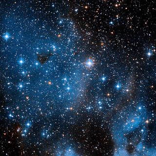 Hubble Spies Emission Nebula-Star Cluster Duo
