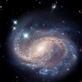 Hubble Captures Majestic Barred Spiral