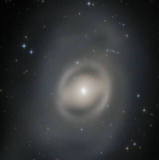 Hubble Sees Galaxy in a Ghostly Haze