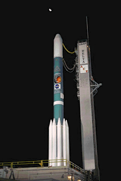 ACE spacecraft on launch pad at night
