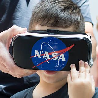 photo of 4-year-old boy with virtual reality goggles