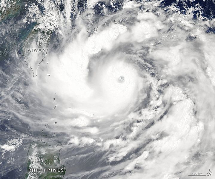 Natural-color Aqua satellite image of Typhoon Hinnamnor near Taiwan and the Philippines