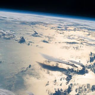 Astronaut photo of clouds over water