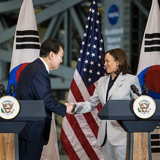 Photo of Vice President Harris and South Korea President Yoon shaking hands at NASA Goddard Space Flight Center