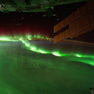 Auroral beads seen from the International Space Station