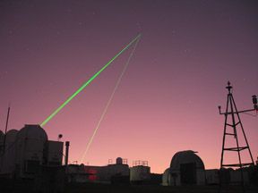Co-location of Two Satellite Laser Ranging Systems at Greenbelt, Maryland (TLRS-4, MOBLAS-7) firing at the same satellite target. TLRS-4 (system on left) and MOBLAS-7 (system in center).  