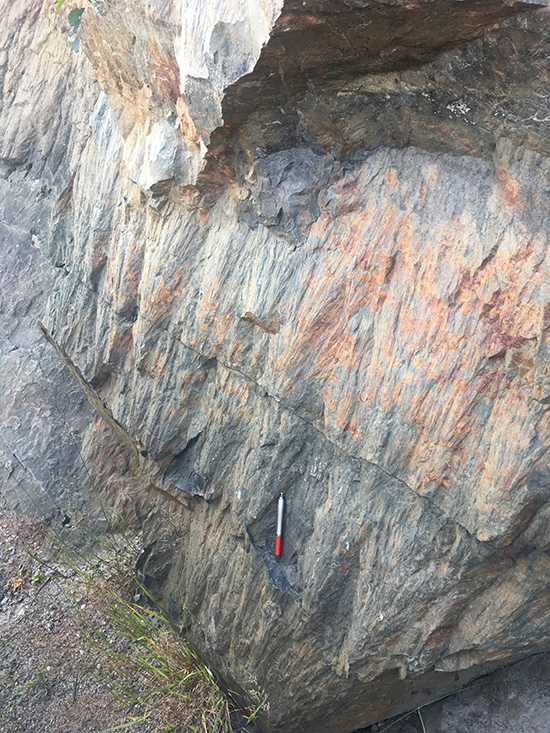 Shatter cones that formed in the metasedimentary rocks 1.85 billion years ago. In this image, multiple shatter cones are visible, the apexes of the cones point toward the bottom left of the frame.
