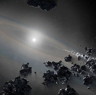 Dead Star Caught Ripping Up Planetary System